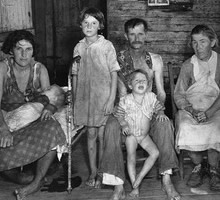 Bud Fields and his family in their home during the Great Depression. Alabama, 1935